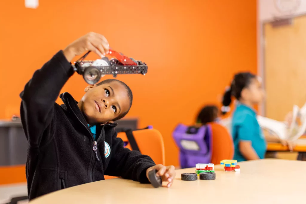 Kids working on a project in class